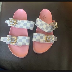 Louis Vuitton’s monogram sandals 36